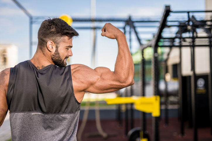 bodybuilder flexing muscles